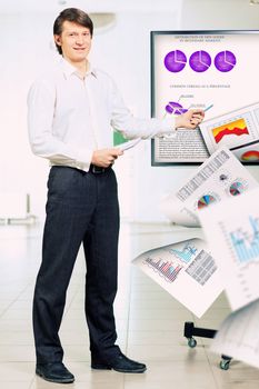 Image of young man making presentation on screen