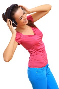 Happy smiling girl dancing and listening to music