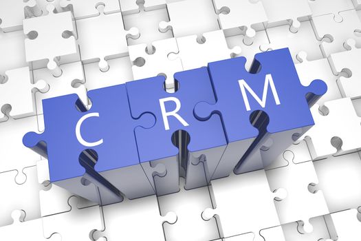 Puzzle concept: acronym CRM on blue jigsaw pieces