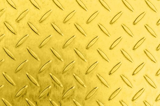 Seamless steel diamond plate texture in golden color from copper