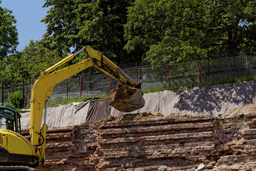 the excavator working on a construction site