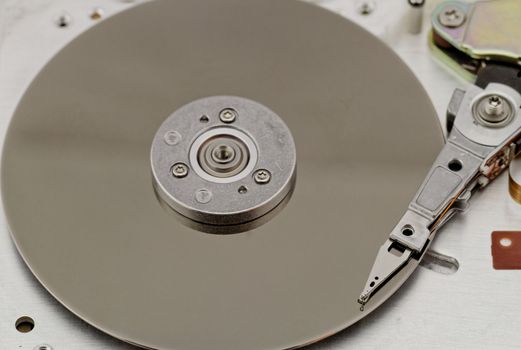Open computer hard drive on white background (HDD, Winchester)