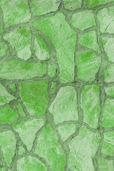 Background of a large stone wall texture (green)