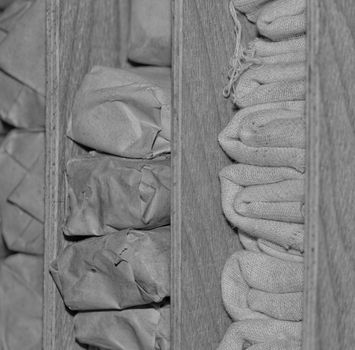 white sterile medical dressings in the old war cabinet bw color