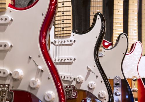 A row of electric Guitar on display