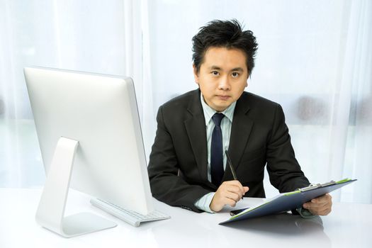 businessman working with desktop computer