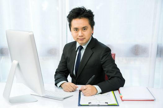 businessman working with desktop computer
