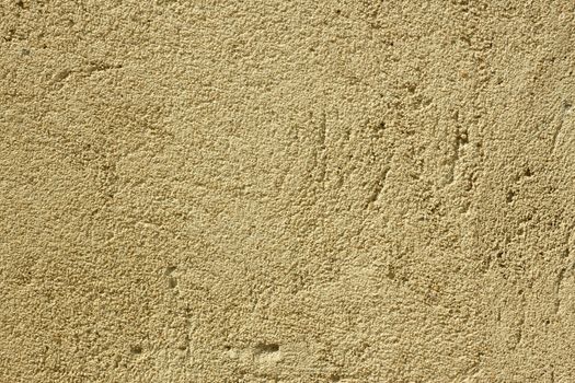 Fragment of new stucco with fine sand and cement close up