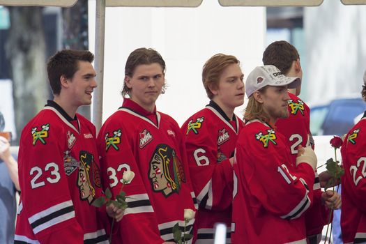 PORTLAND, OREGON - MAY 14: Portland Winterhawks Ice Hockey Team members presented with Rose at Pioneer Courthouse  on May 14, 2013, after winning the Western Hockey League Championship and bringing home the Ed Chynoweth Cup