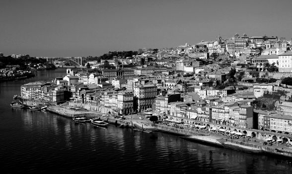 Portugal. Porto city. View of Douro river embankment in the morning  in black and white
