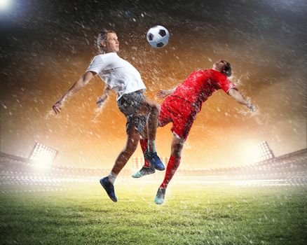 Image of two football players at stadium