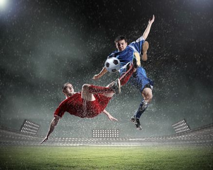 Image of two football players at stadium