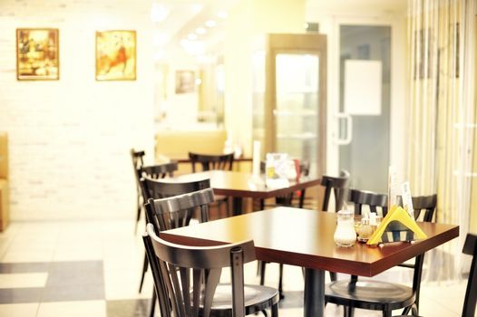 Empty tables in a small cafeteria