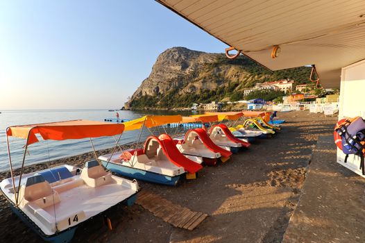 Water bicycles on the bank of the Black Sea