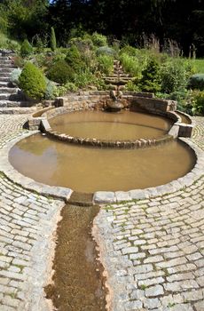 The Vesica Pool in the Chalice Well Gardens in Glastonbury.