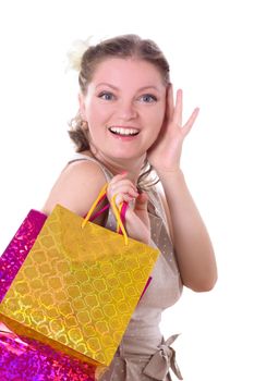 Shocked woman with shopping bags isolated on white