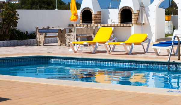 Beautiful swimming pool in hotel in sunny day