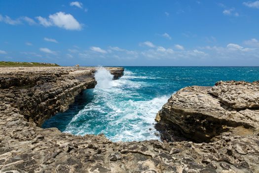 Rocky Limestone Coastline at Devil's Bridge Antigua in Sunshine