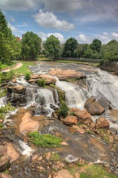 Long exposure captures the slow flowing Reedy River at Falls Park