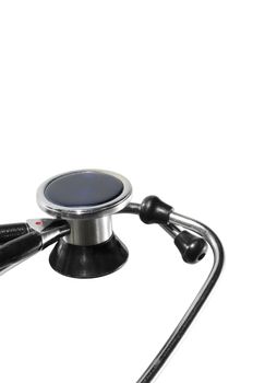 close up of a stethoscope isolated on white background cropped vertically