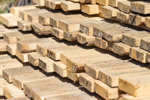 Wood Planks piled in a construction yard