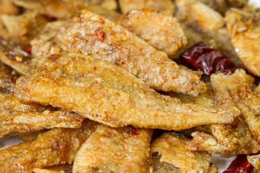 seasoning crispy fried fish, hot and spicy