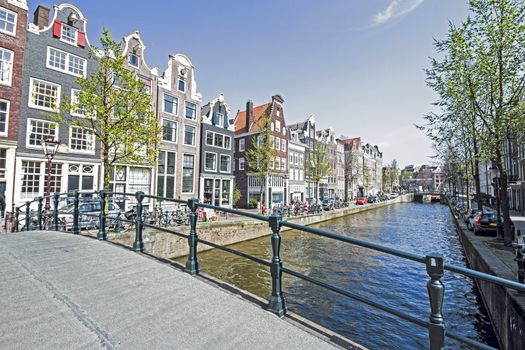 Medieval houses along the canal in Amsterdam Netherlands