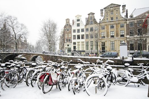 Bicycles in the snow in Amsterdam the Netherlands