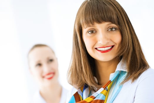 young successful business woman smiling and looking in camera