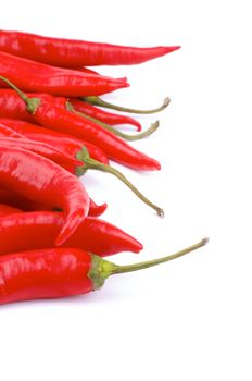 Frame of Ripe Red Chili Peppers isolated on white background