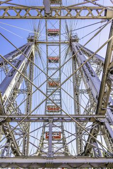 Metal construction of the ferris wheel at the Prater in Vienna, Austria, with the city in the background