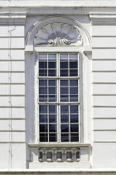 White muntin window on a historic building