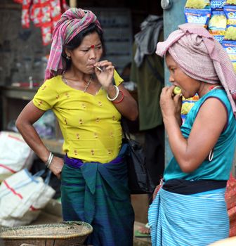 Indigenous Reang (Bru) women at the border market between Tripura and Mizoram states in NE India. May 29, 2012. The Reang or Bru community lives on both sides of the border and is object of disputes between both states.