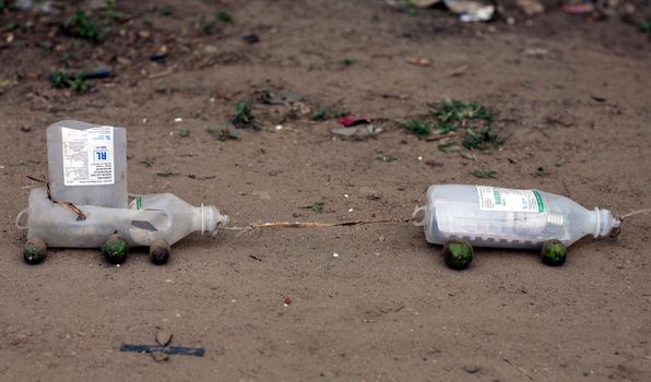 Toy cars constructed from medical waste in a village in eastern DR Congo.