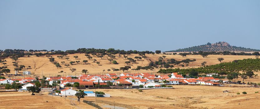 A small village in the countryside, close to the hills