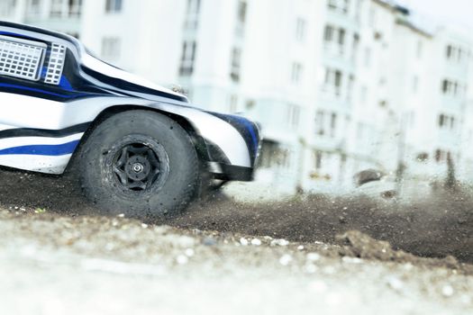 rapidly whirling wheel of a radio-controlled cars