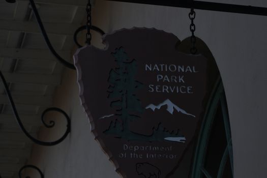 National Park Service sign hanging in the French Quarter in New Orleans, Louisiana