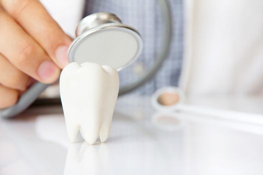 molar with dentist background ,dental concept