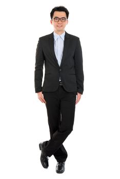 Handsome full body Asian business man in formal full suit standing isolated on white background