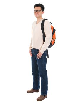 Full body Asian adult student in casual wear with school bag standing isolated on white background. Asian male model.