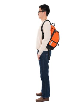 Side view full body Asian adult student in casual wear with school bag standing isolated on white background. Asian male model.
