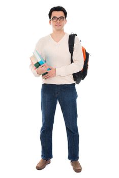 Full body Asian adult student in casual wear with school bag carrying text books standing isolated on white background. Asian male model.