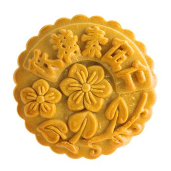 Traditional mooncake isolated on white background. Chinese mid autumn festival foods. The Chinese words on the mooncake means assorted fruits nuts, not a logo or trademark.