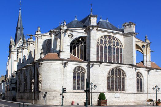 a Gothic Catholic church with its bell tower on blue sky background