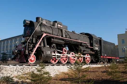 Monument of old steam locomotive. Ulan-Ude, capital city of the Buryat Republic, Russia