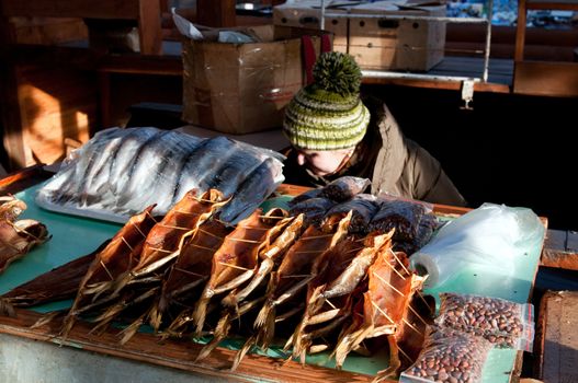 Omul fish at the Listvyanka market. Listvyanka urban-type settlement on Lake Baikal