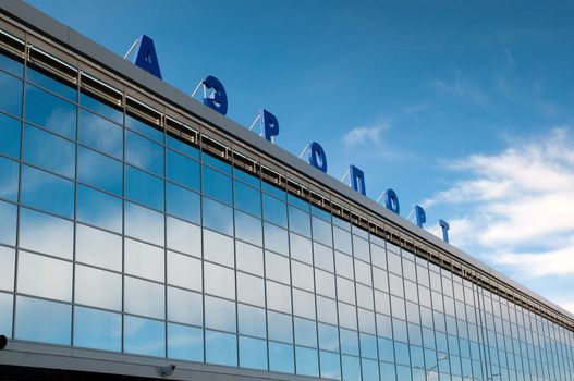 The modern russian airport with airplane over it