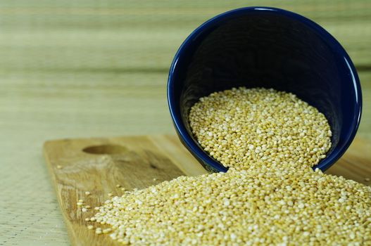 Quinoa Grains and blue bowl