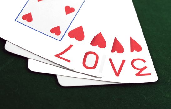 playing cards with the word love