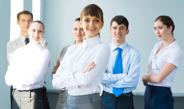 concept of teamwork, business woman crossed her arms over her team